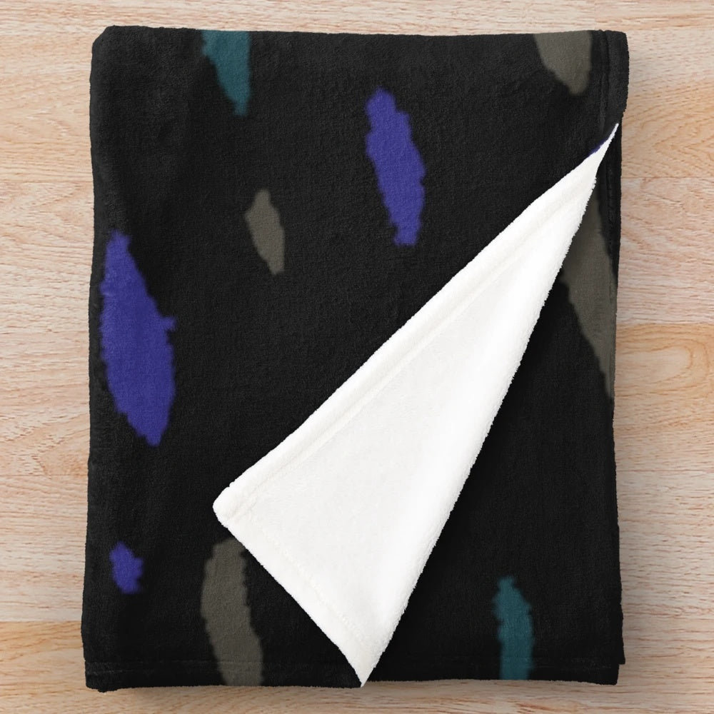 Plush blanket with a colorful confetti pattern inspired by classic JDM car upholstery