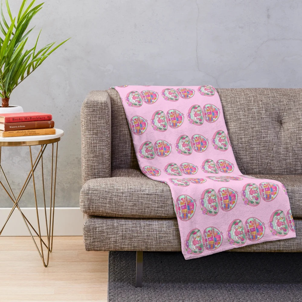 Retro 90s Polly Pocket themed plush blanket with birthday party decorations
