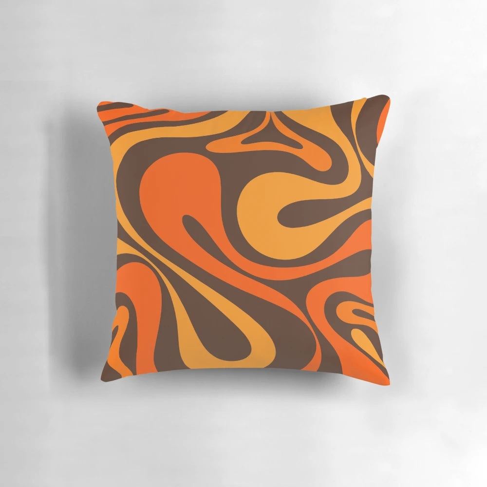 Retro abstract pattern in 70s orange and brown colors on a decorative pillow