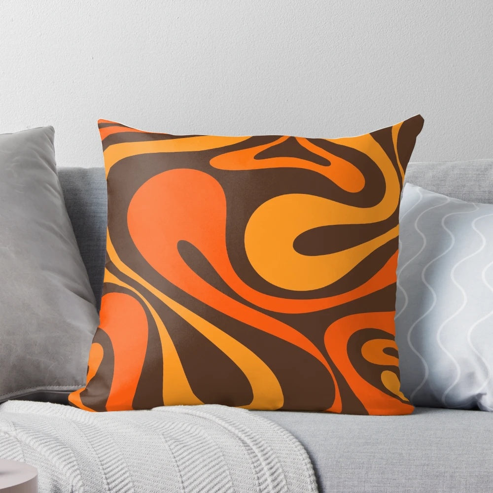 Retro abstract pattern in 70s orange and brown colors on a decorative pillow