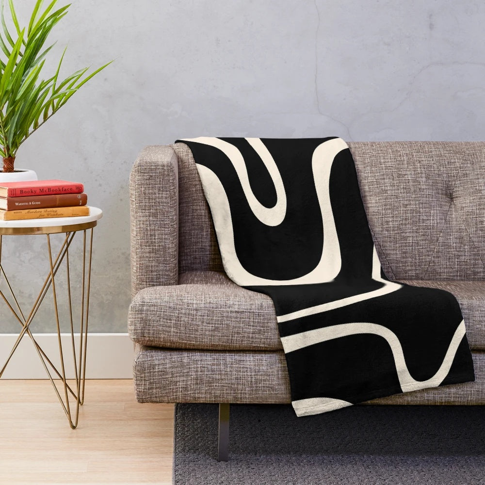 Retro abstract pattern plush blanket in black and almond cream colors