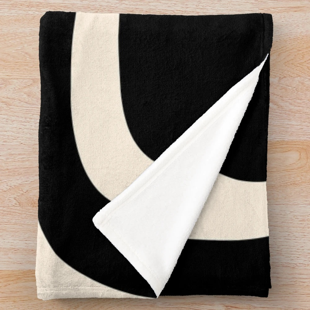 Retro abstract pattern plush blanket in black and almond cream colors