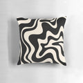 Retro abstract pillow with black and almond cream swirl pattern