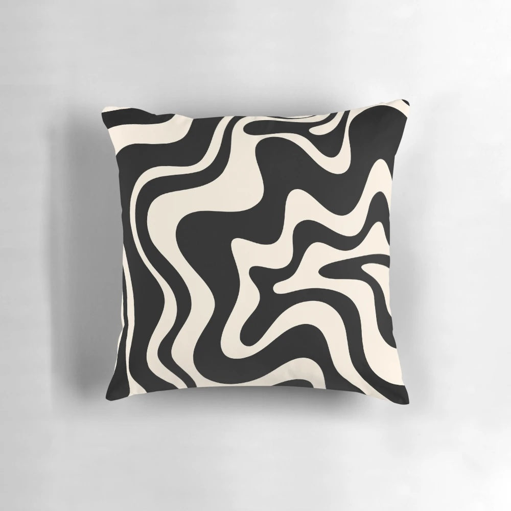 Retro abstract pillow with black and almond cream swirl pattern