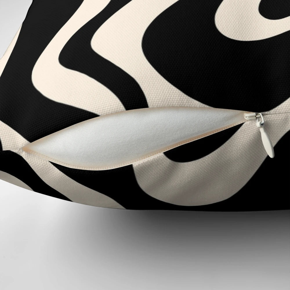 Retro abstract pillow with black and almond cream swirl pattern