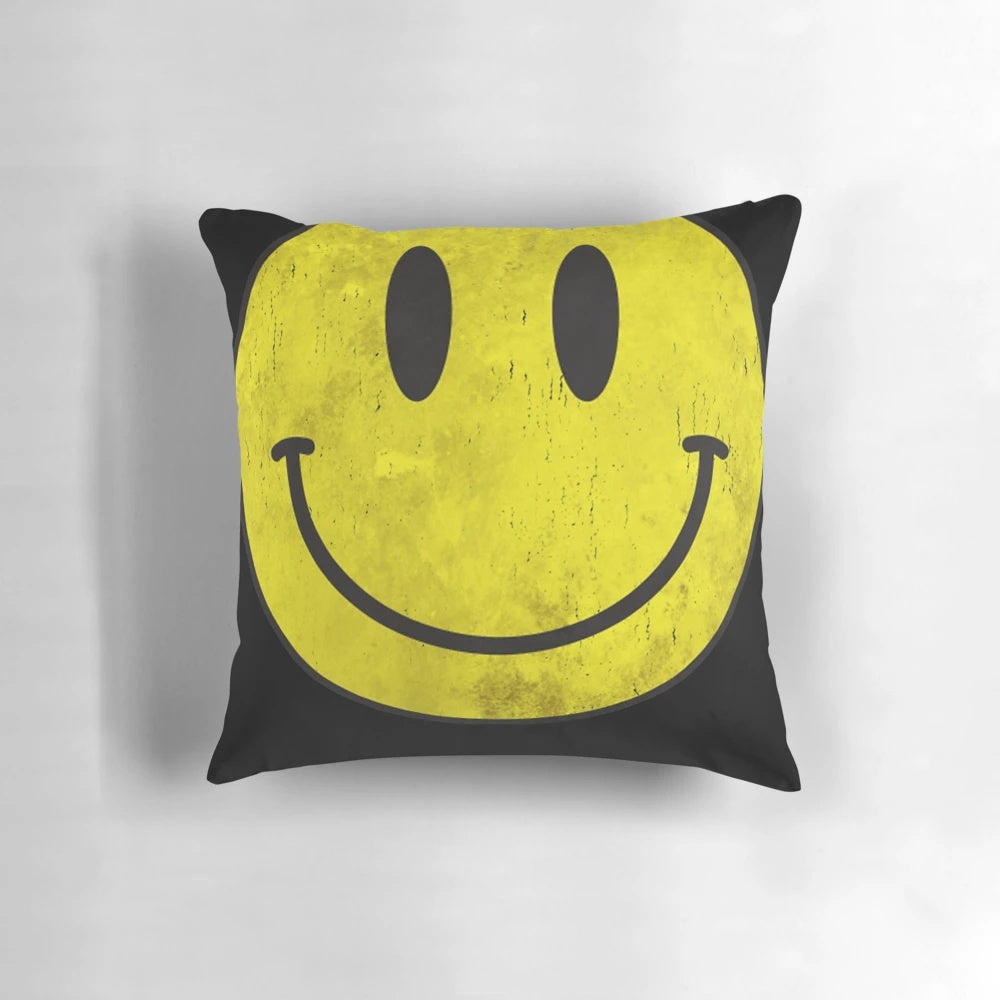 Distressed acid house style throw pillow with a vibrant, psychedelic design