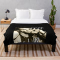 Plush blanket featuring a retro image of the famous Algerian actor, Omar Gatlato