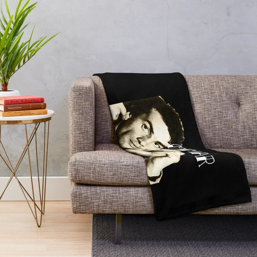 Plush blanket featuring a retro image of the famous Algerian actor, Omar Gatlato