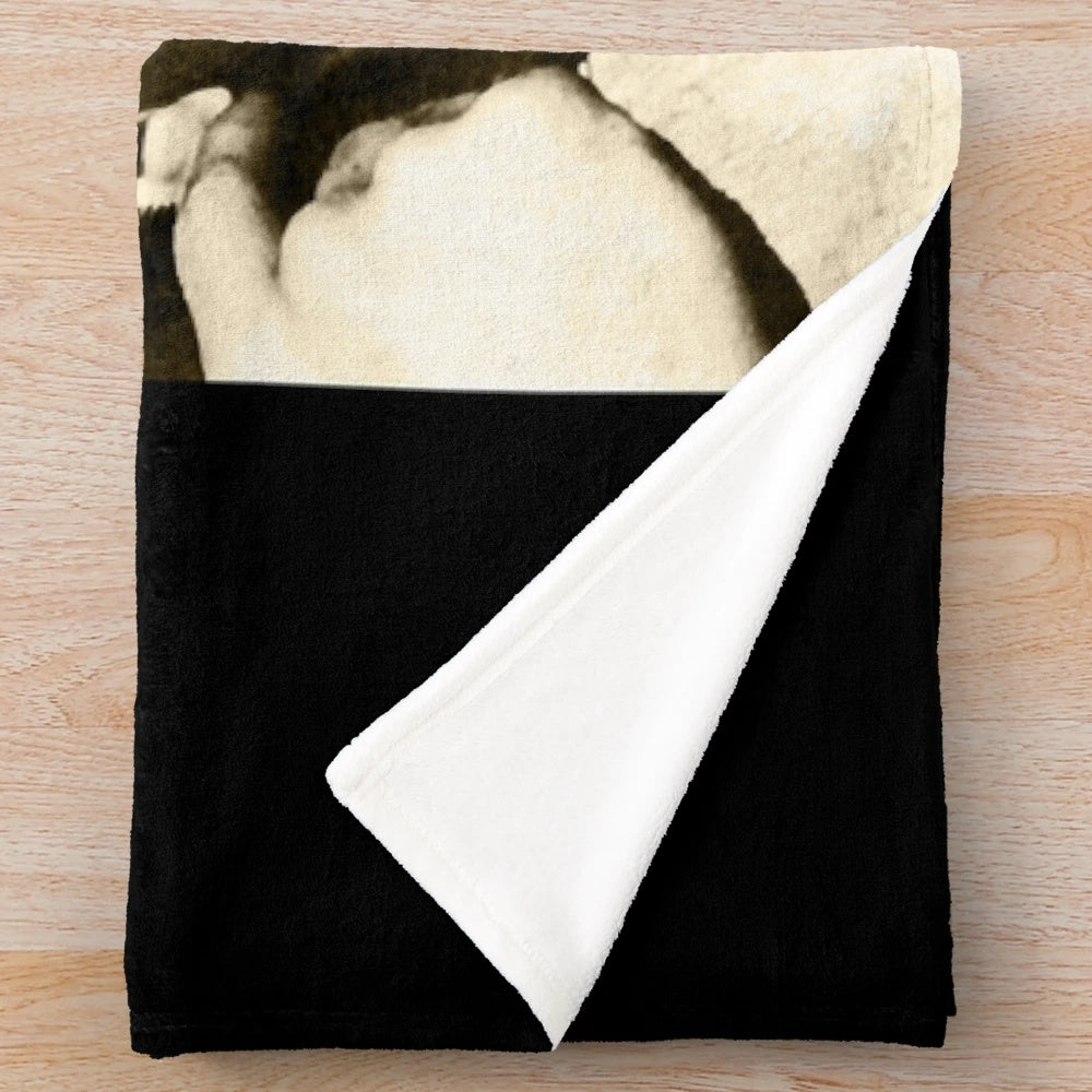 Plush blanket featuring a retro image of the famous Algerian actor, Omar Gatlato