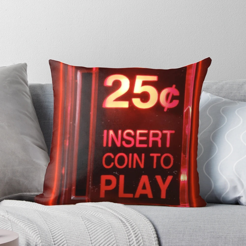 Retro arcade-inspired pillow with "Insert Coin" design
