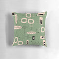 Mid-century modern abstract green pillow with atomic-inspired design
