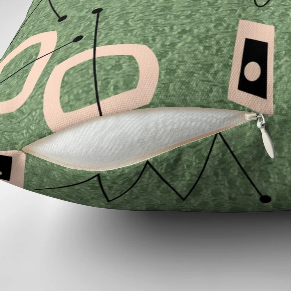 Mid-century modern abstract green pillow with atomic-inspired design