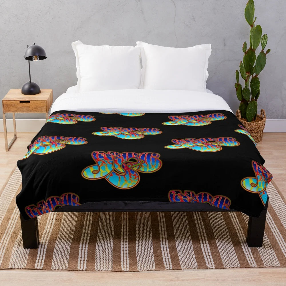 Plush blanket featuring retro band logos for classic rock music fans
