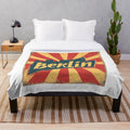 Retro Berlin-inspired plush blanket with geometric art deco design