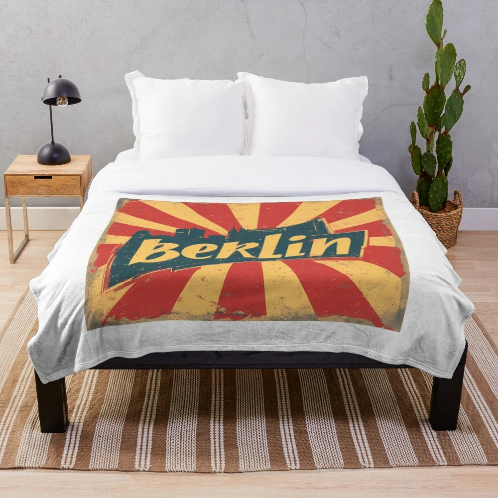 Retro Berlin-inspired plush blanket with geometric art deco design