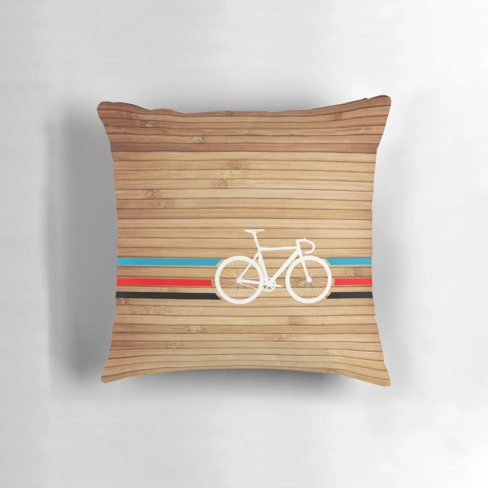 Vibrant Pillow with Retro Cycling Emblem and Stripe Design