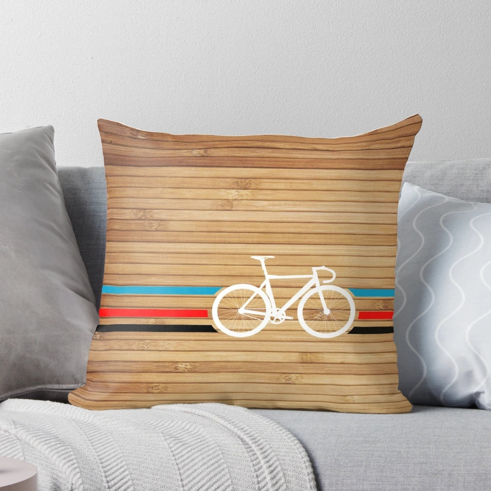 Vibrant Pillow with Retro Cycling Emblem and Stripe Design