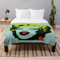 Plush blanket featuring blue pop art portrait of Marilyn Monroe by Andy Warhol