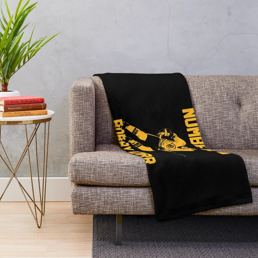 Plush blanket featuring a vintage Bobby Orr inspired design