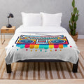 Vintage 80s boombox-themed plush blanket with colorful, nostalgic design
