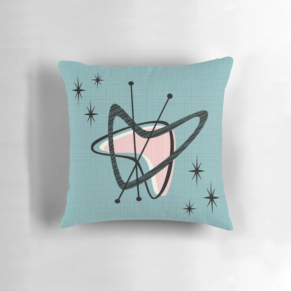 Retro boomerang and starburst patterned accent pillow for mid-century modern home decor