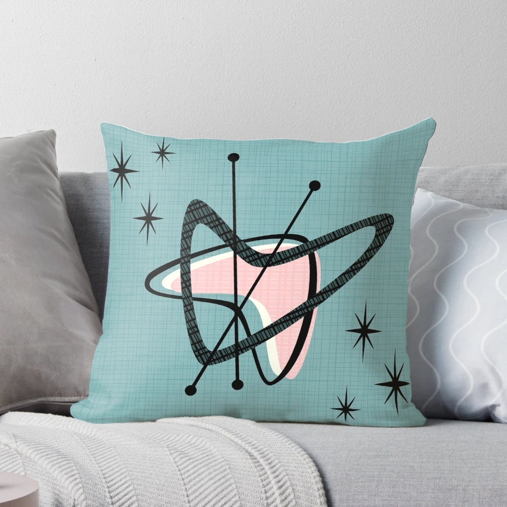 Retro boomerang and starburst patterned accent pillow for mid-century modern home decor