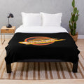 Retro Canucks hockey plush blanket featuring the iconic team logo and colors