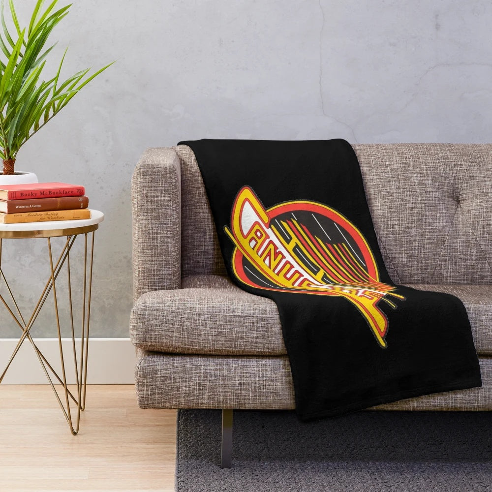 Retro Canucks hockey plush blanket featuring the iconic team logo and colors