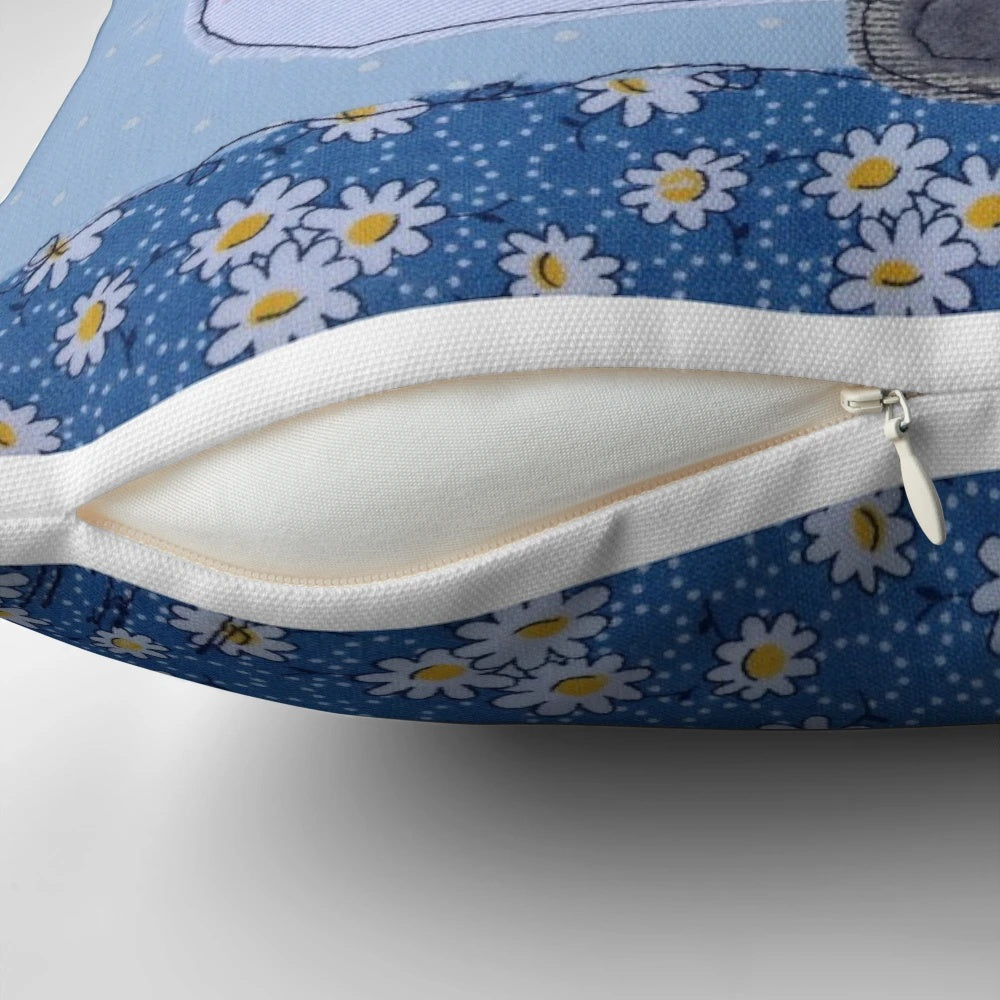 Retro-style white caravan or camper van-inspired decorative pillow with appliqué and embroidered details