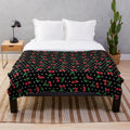 Red cherries and polka dots plush blanket with a rockabilly pattern
