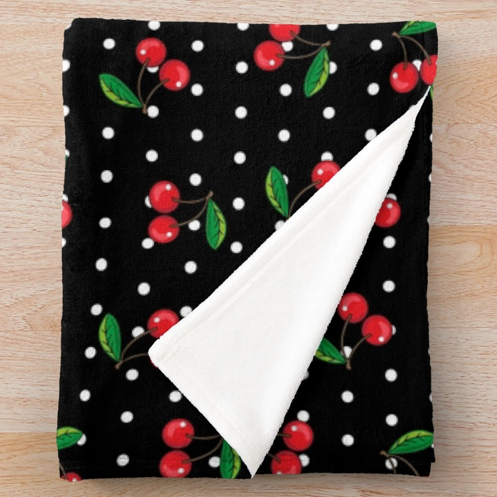 Red cherries and polka dots plush blanket with a rockabilly pattern