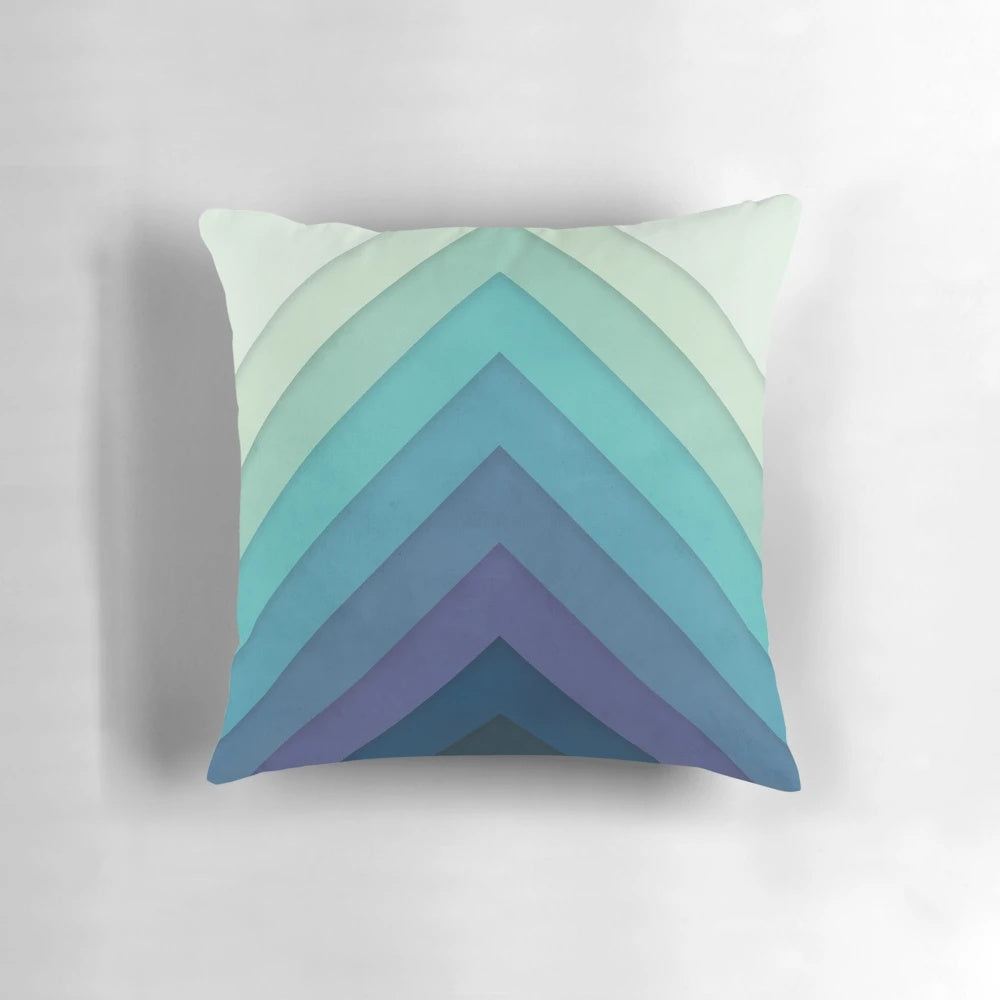 Retro-inspired chevron pattern pillow in a gradient color design