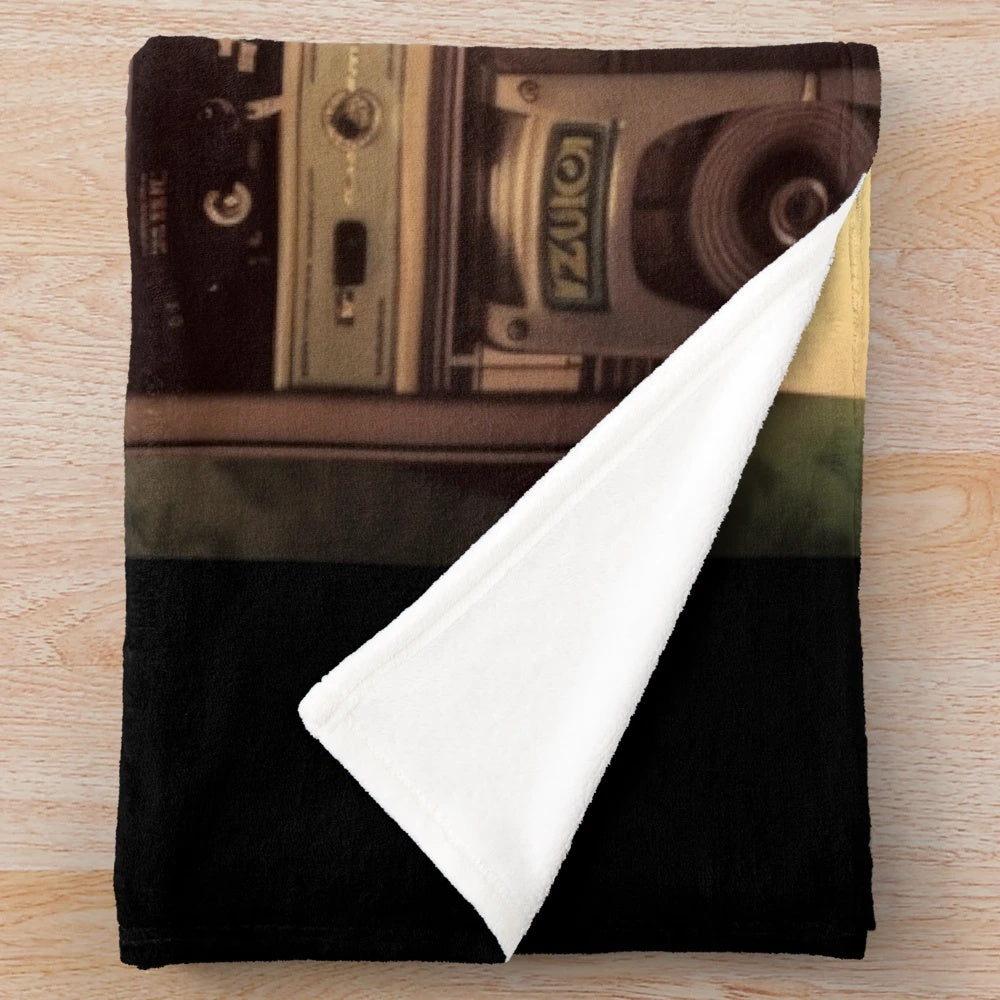 Retro-style plush blanket with classic movie design