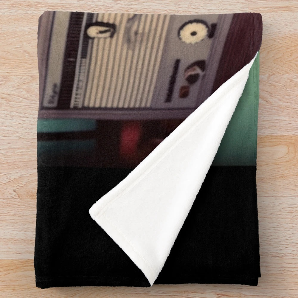 Plush blanket with vintage movie design, perfect for classic film enthusiasts