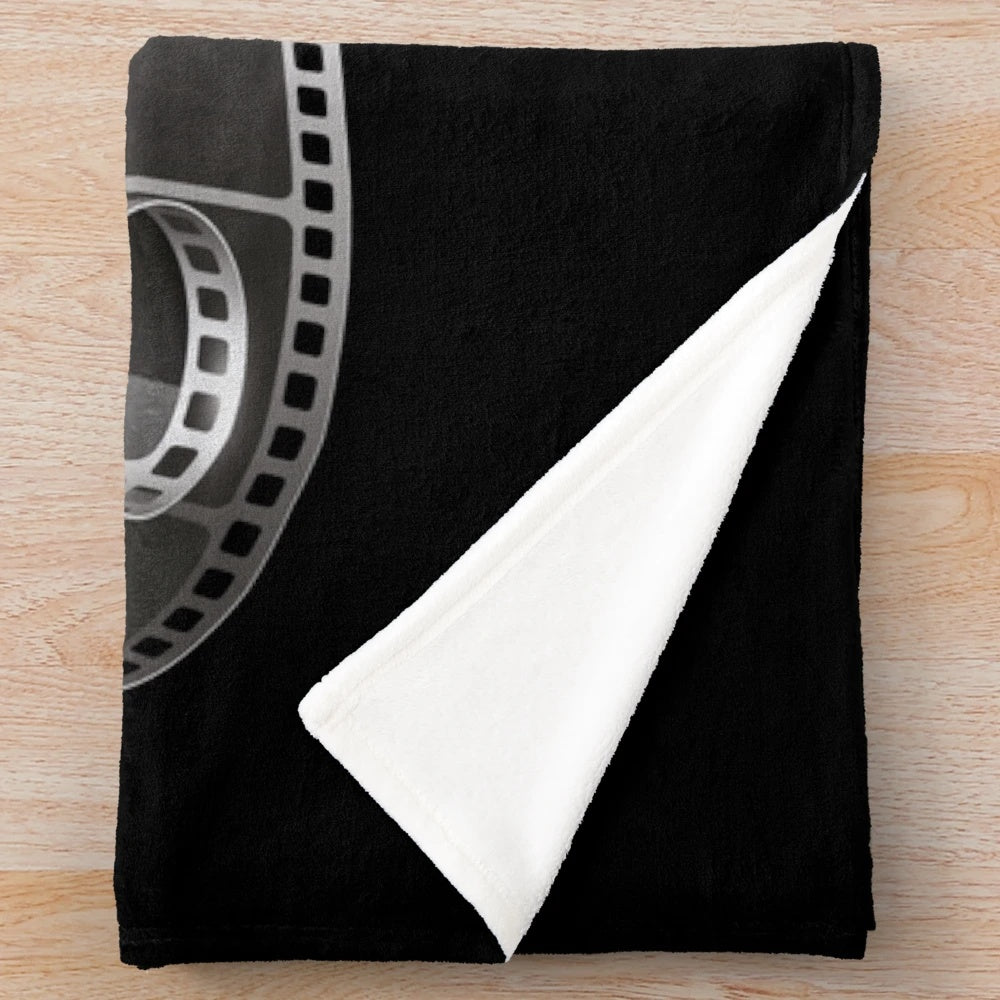 Retro cinema inspired plush movie theater blanket with vintage movie tickets and snacks graphics