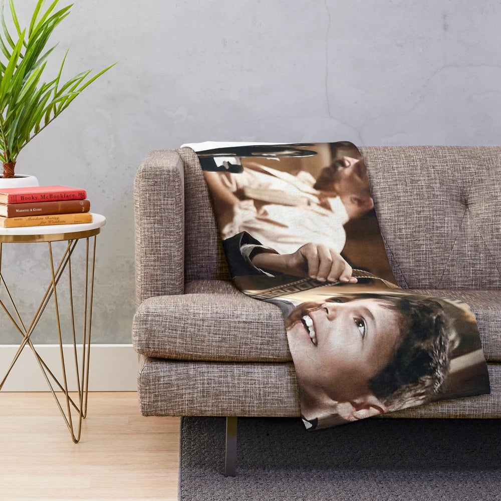 Cozy retro cinema-themed plush blanket