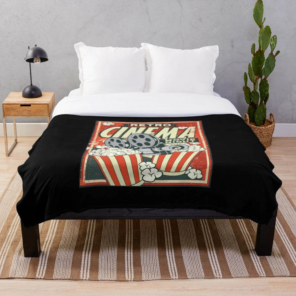 Retro cinema-themed plush blanket with a vintage movie design