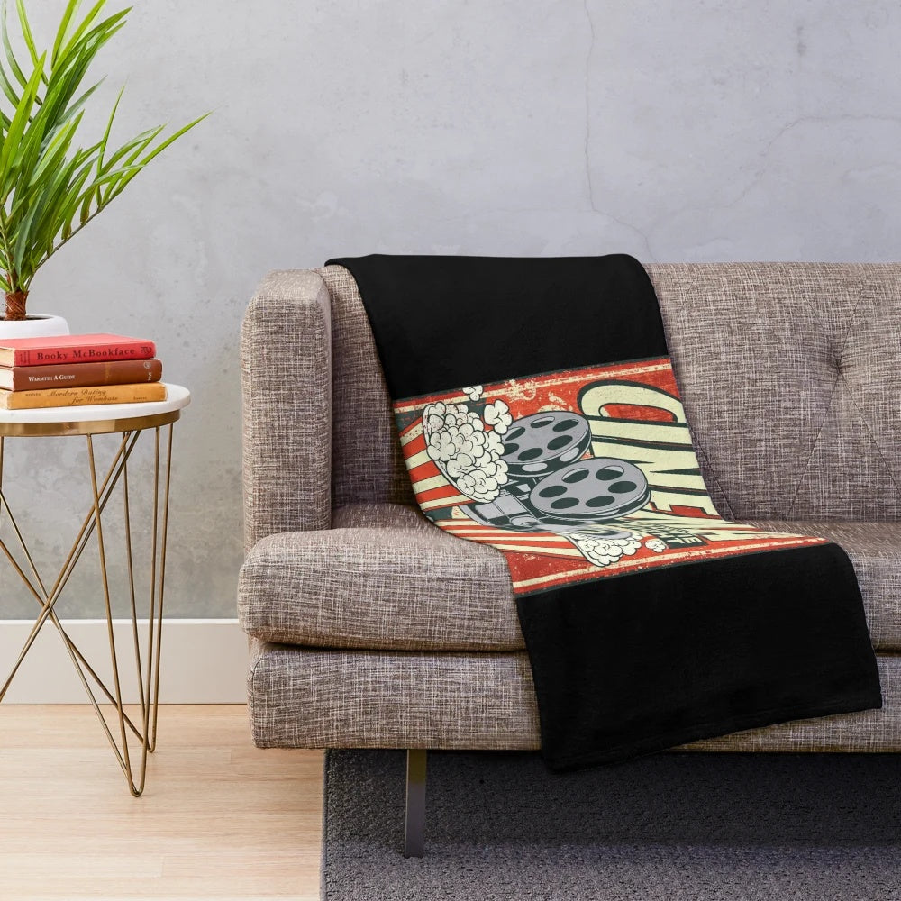 Retro cinema-themed plush blanket with a vintage movie design