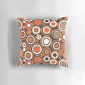Retro circle pattern throw pillow in orange, white, and brown colors
