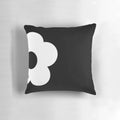 Retro-inspired black and white floral graphic decorative throw pillow
