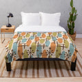 Colorful mid century modern style plush blanket with abstract cosmic surfing pattern