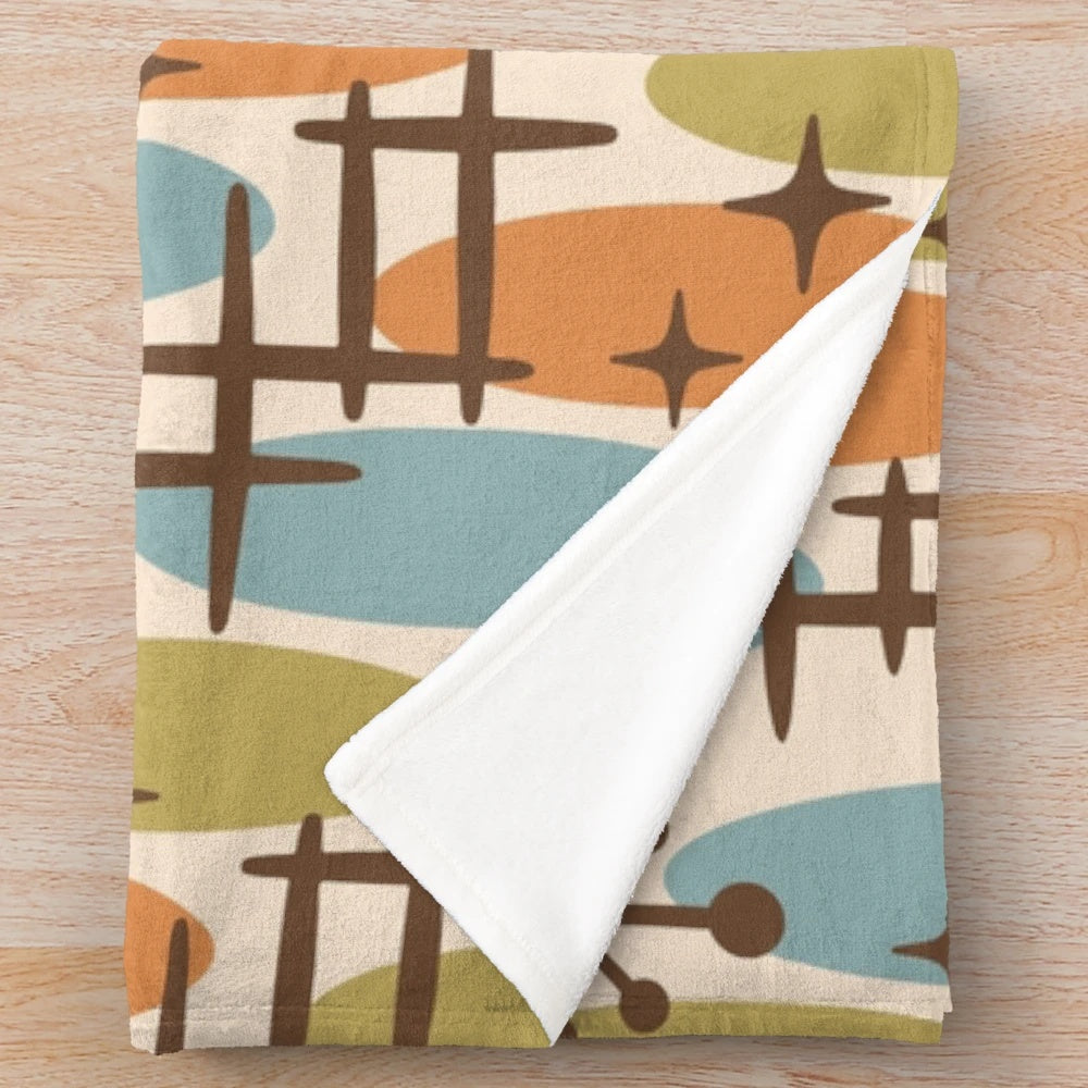 Colorful mid century modern style plush blanket with abstract cosmic surfing pattern