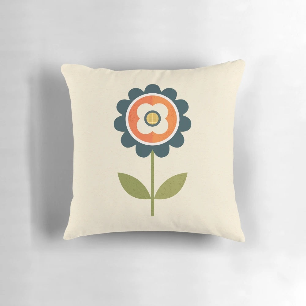 Retro daisy floral pattern pillow in orange and cream colors