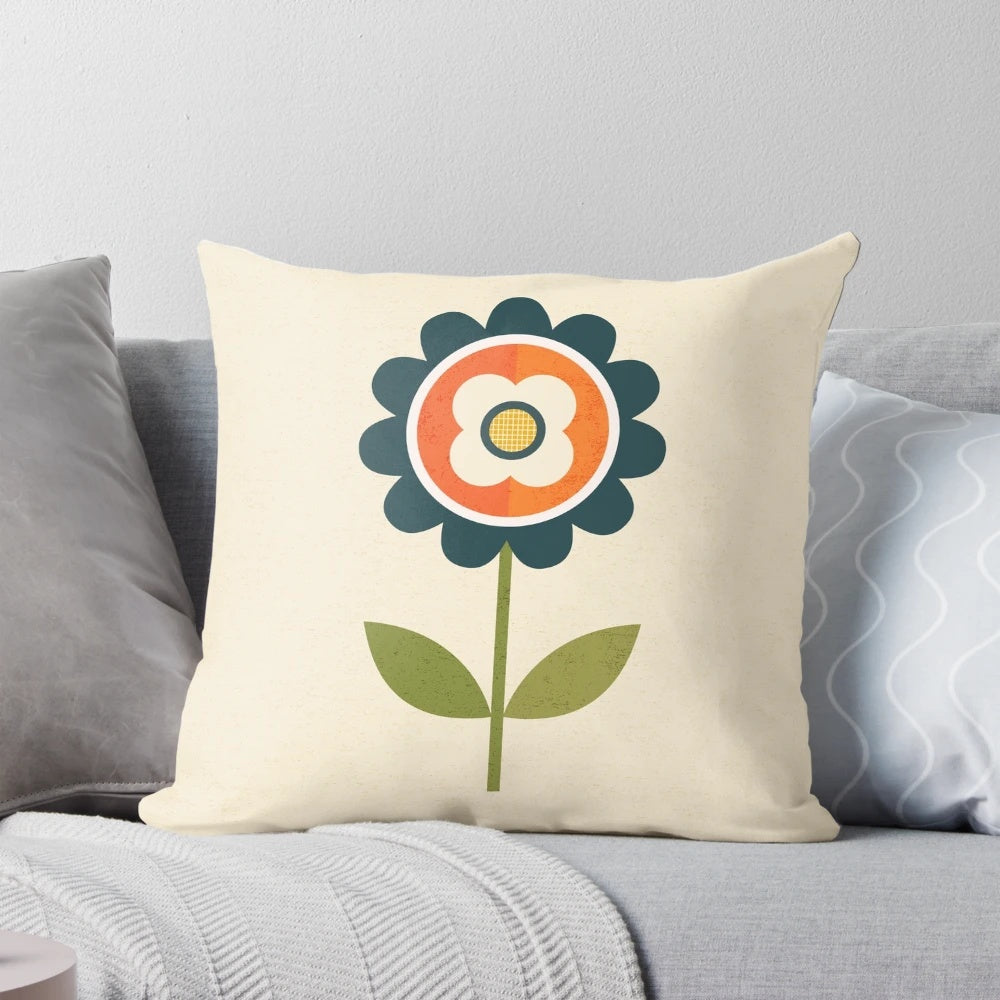 Retro daisy floral pattern pillow in orange and cream colors