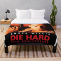 Die Hard themed plush blanket with Bruce Willis and John McClane