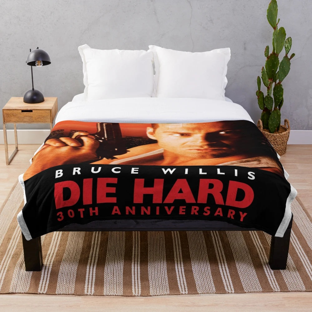 Die Hard themed plush blanket with Bruce Willis and John McClane