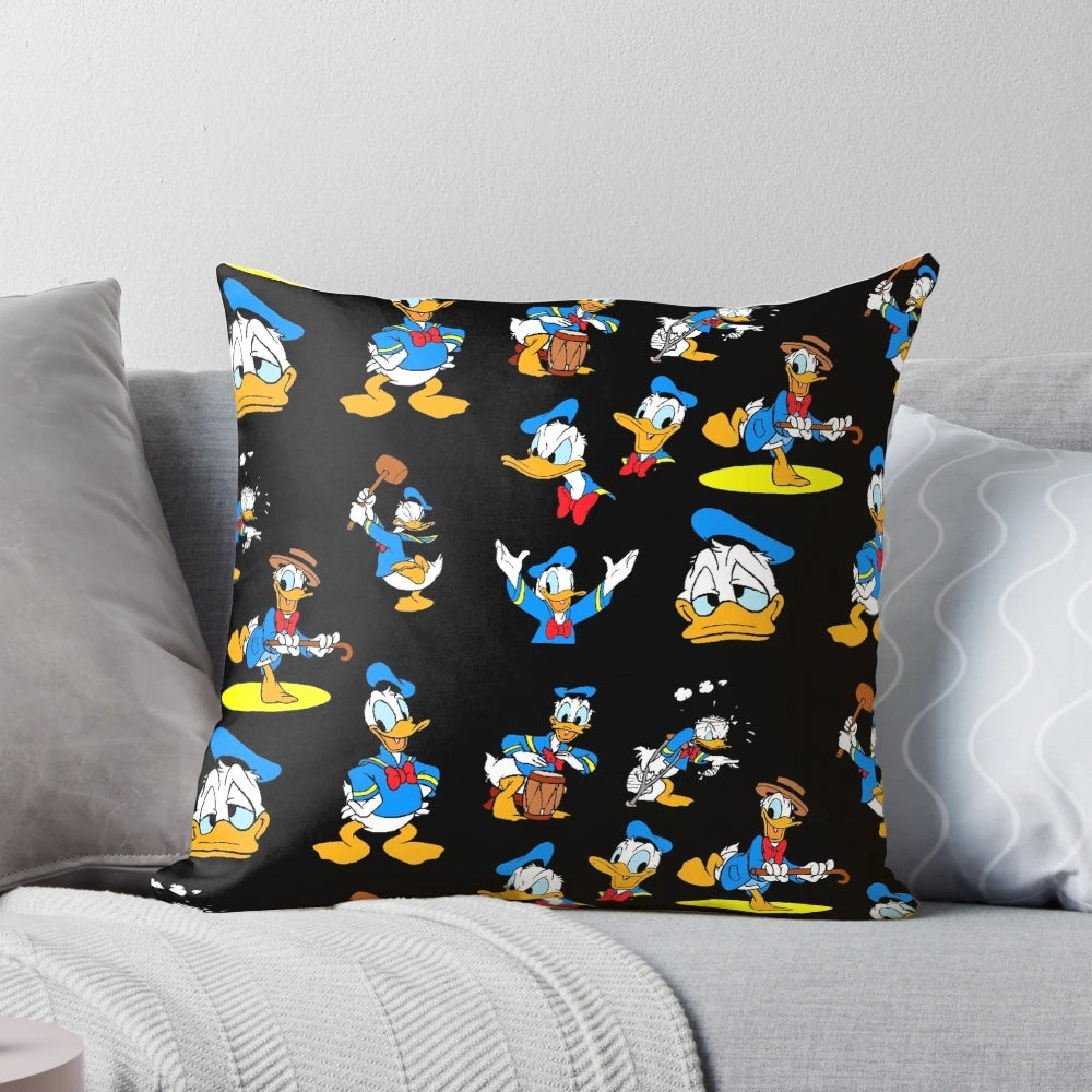 A colorful, retro-inspired pillow featuring a collage of iconic Donald Duck images in a vintage, aesthetic design.