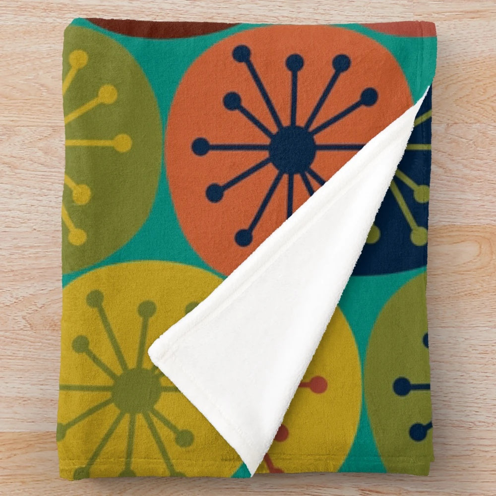 Retro dots plush blanket with midcentury modern pattern in teal, green, mustard, orange, blue, and turquoise
