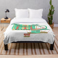 Plush blanket featuring a vintage drive-in theater design, perfect for a cozy movie night