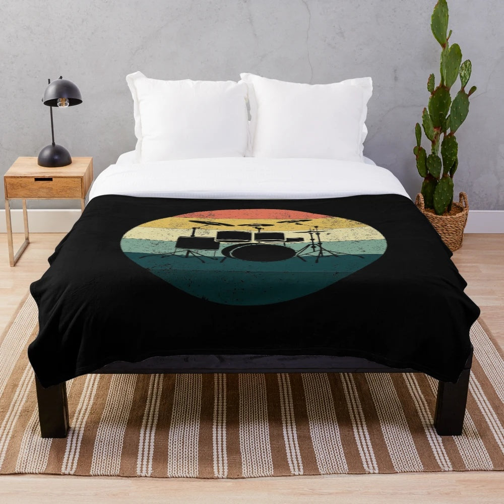 Retro drum plush blanket featuring a vintage drum set design